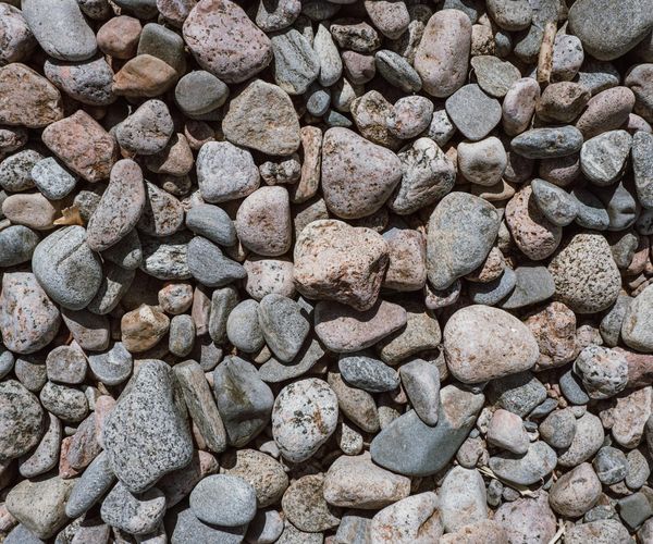 Abstract image representing balance with stacked stones on a serene background.